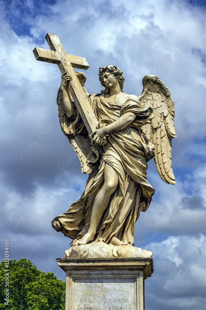 Angel with the Cross statue on the Ponte Sant' Angelo bridge, Rome, Italy