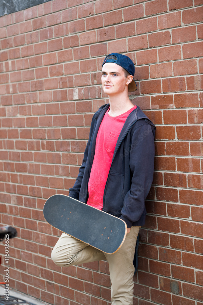 Handsome guy with skateboard