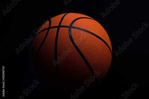 basketball on a black background © StockBox