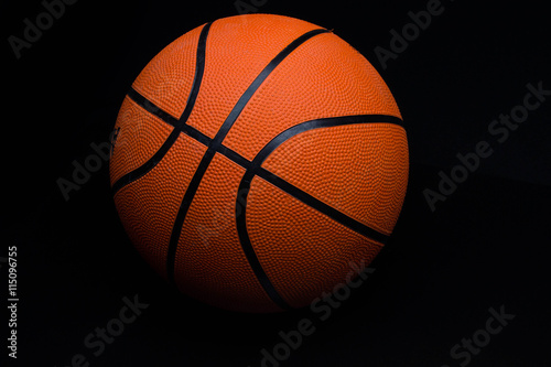 basketball on a black background © StockBox