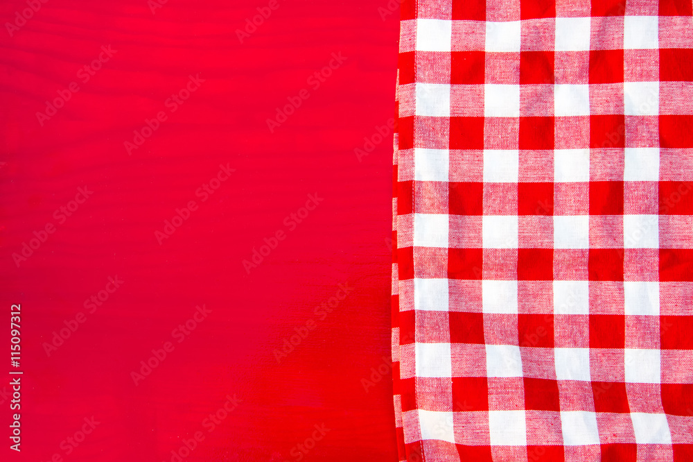 Red napkin at red wooden table