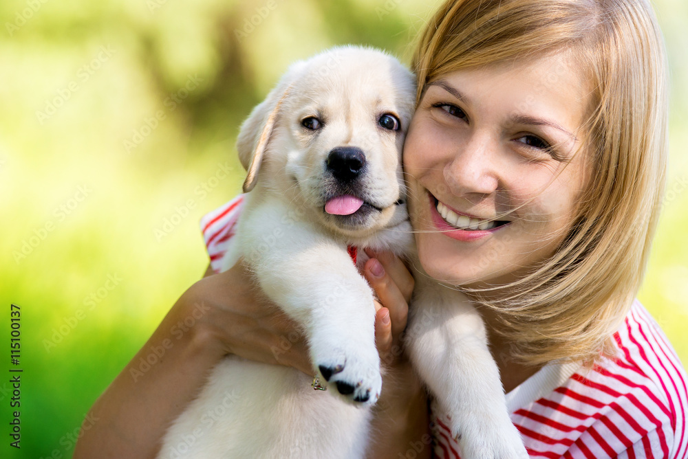 Girl with labrador puppy Girl with labrador puppy
