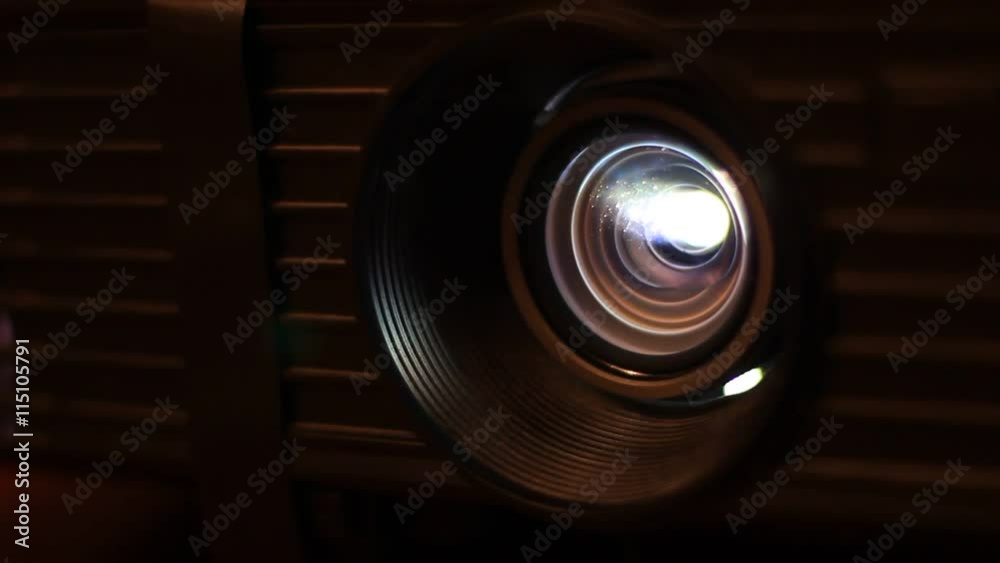 cinema projector lens with playing video light