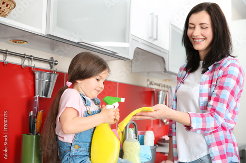 Daughter and mother cleanin...