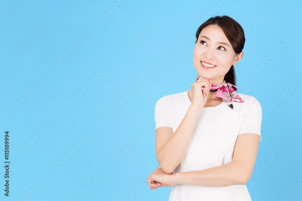 portrait of asian business woman isolated on blue background portrait of asian business woman isolated on blue background