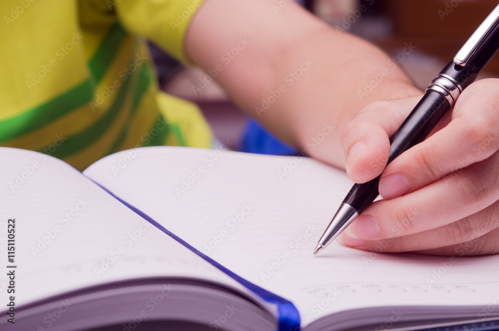 Write activity with a pen and a book Write activity with a pen and a book