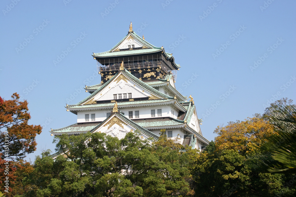 landscape view of the osaka castle main tower in early autumn landscape view of the osaka castle main tower in early autumn