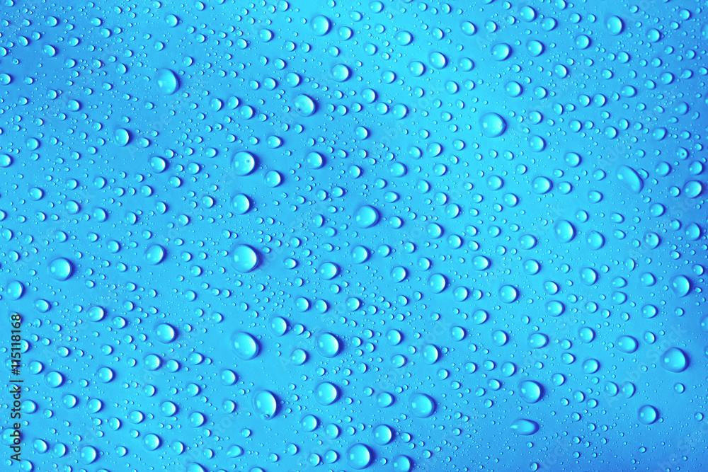 water drop on fresh blue background