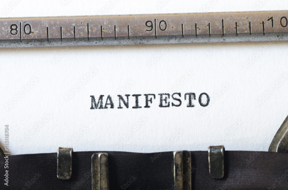 word manifesto typed on typewriter - obrazy, fototapety, plakaty 