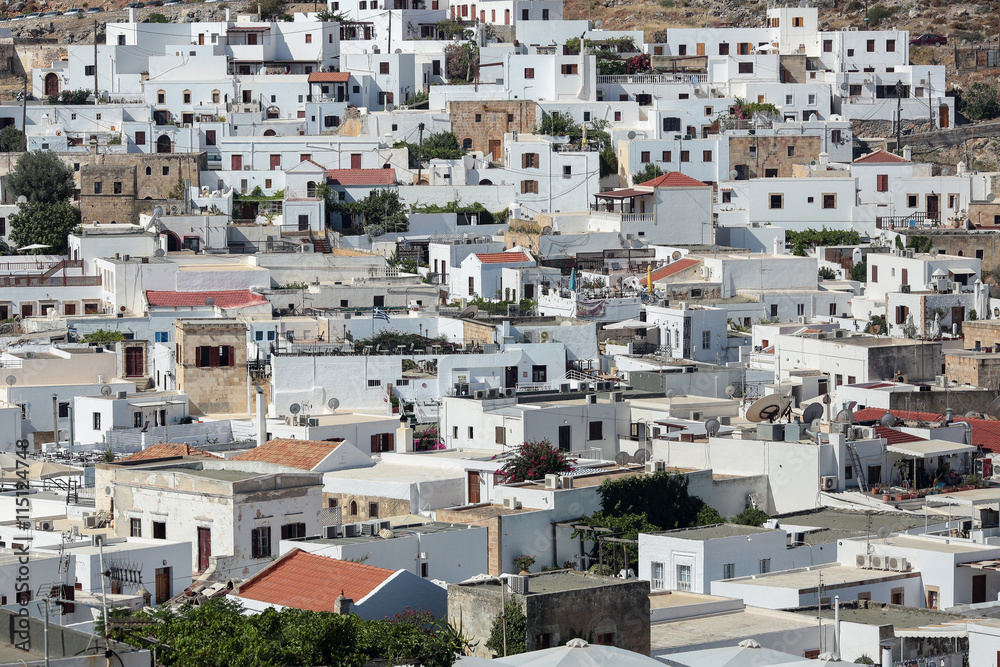 White houses in the small town Londos, located at the island Rhodes, Greece White houses in the small town Londos, located at the island Rhodes, Greece