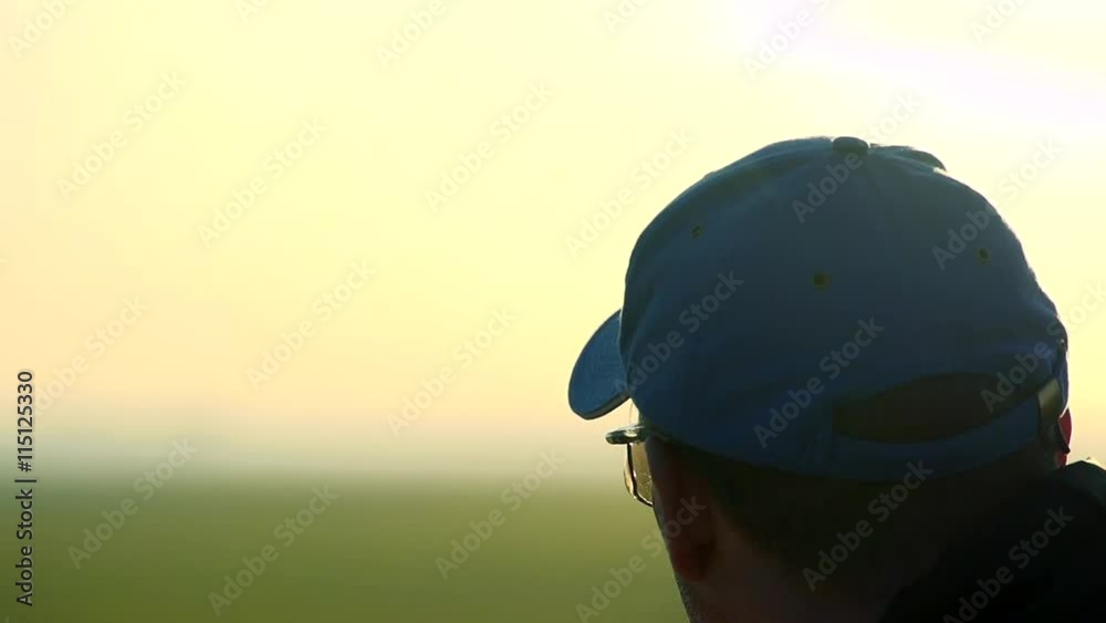 Slowmotion detail of man from back who observe landscape Slowmotion detail of man from back who observe landscape