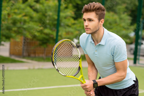 Handsome young sportsman playing tennis © Yakobchuk Olena