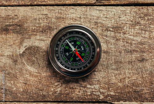 Compass on a wood deck
