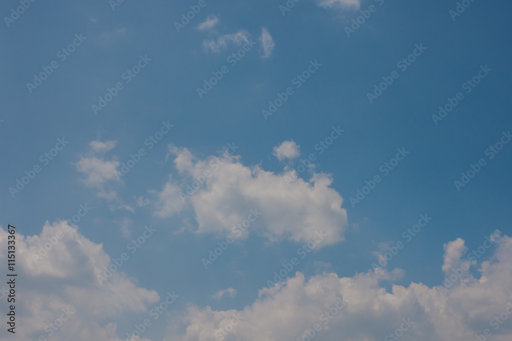 Clouds and mountains reflected in the lake
