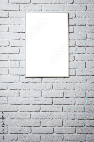 blank black picture frame on the wall