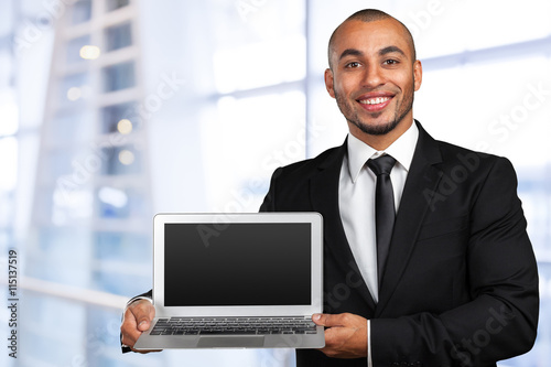 black business man with laptop