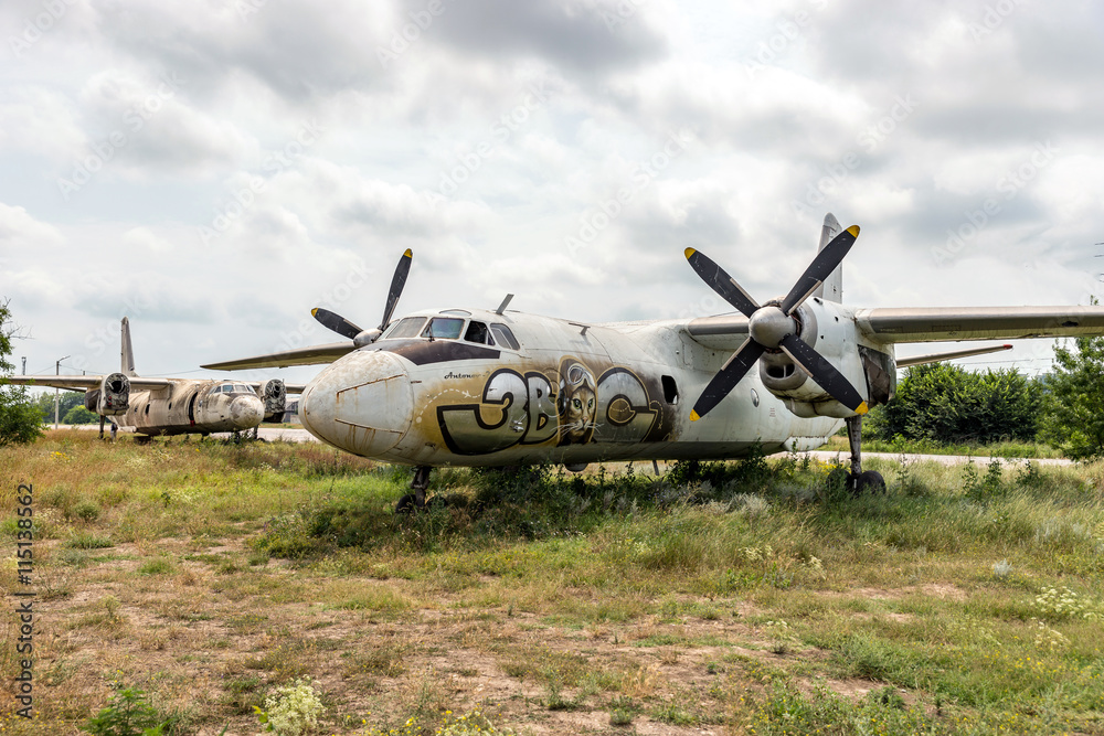 Older aircraft flying in an abandoned airport Older aircraft flying in an abandoned airport