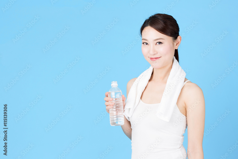 attractive asian woman isolated on blue background attractive asian woman isolated on blue background
