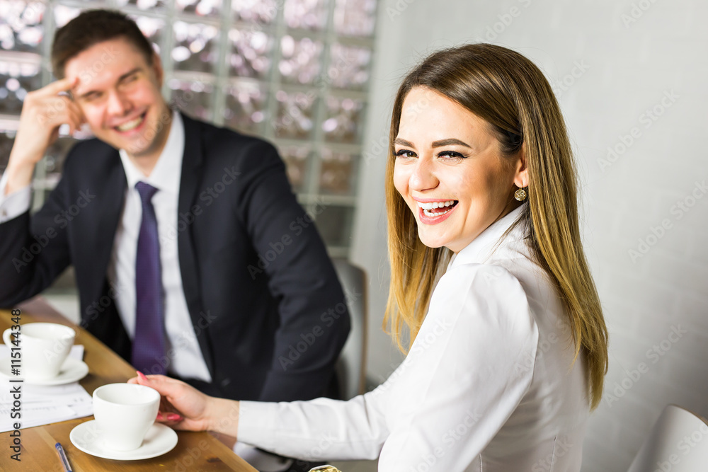 Successful business woman looking confident and smiling