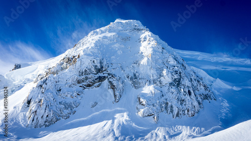 Winds on a snowy Mont Blanc du Tacul photo