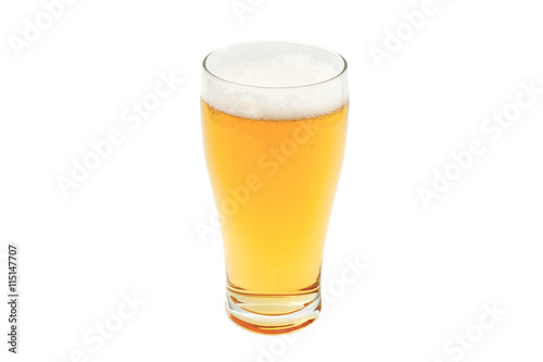 amber beer in pint glass on white background