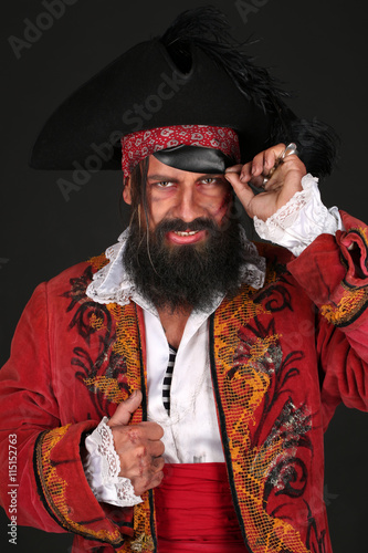 Portrait of handsome man in a pirate costume