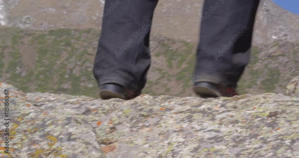 People - shoes close up. Man and Woman walking on trail
in mountain outdoors. Steampunk still. Charyn grand canyon. People - shoes close up. Man and Woman walking on trail
in mountain outdoors. Steampunk still. Charyn grand canyon.