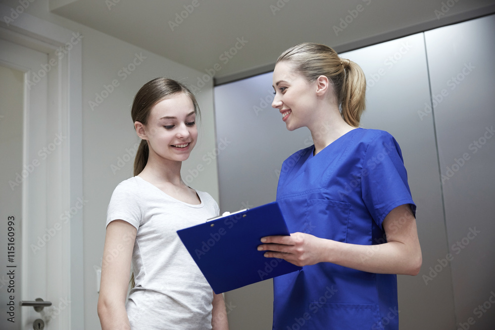 © Syda Productions - smiling nurse with clipboard and girl at hospital © Syda Productions - smiling nurse with clipboard and girl at hospital