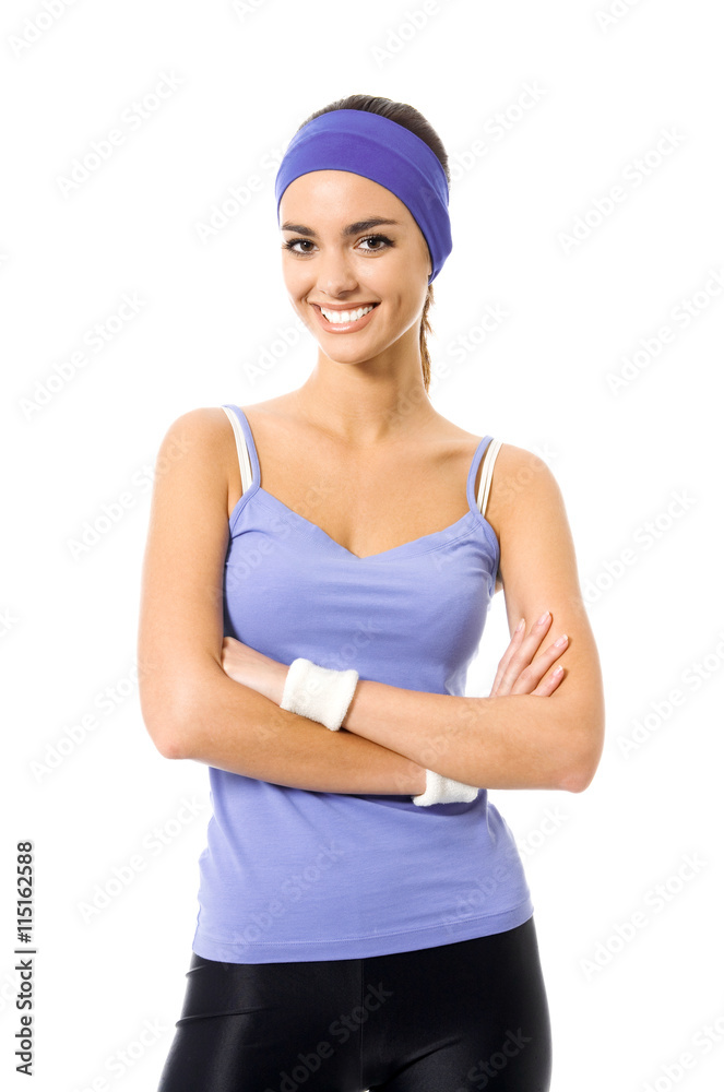 Portrait of smiling sporty brunette woman, on white