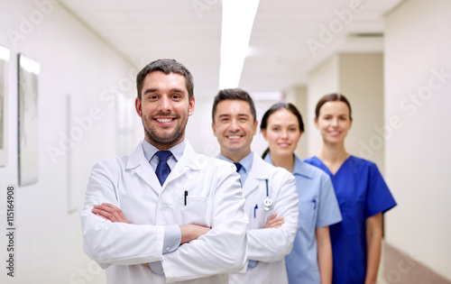 group of happy medics or doctors at hospital