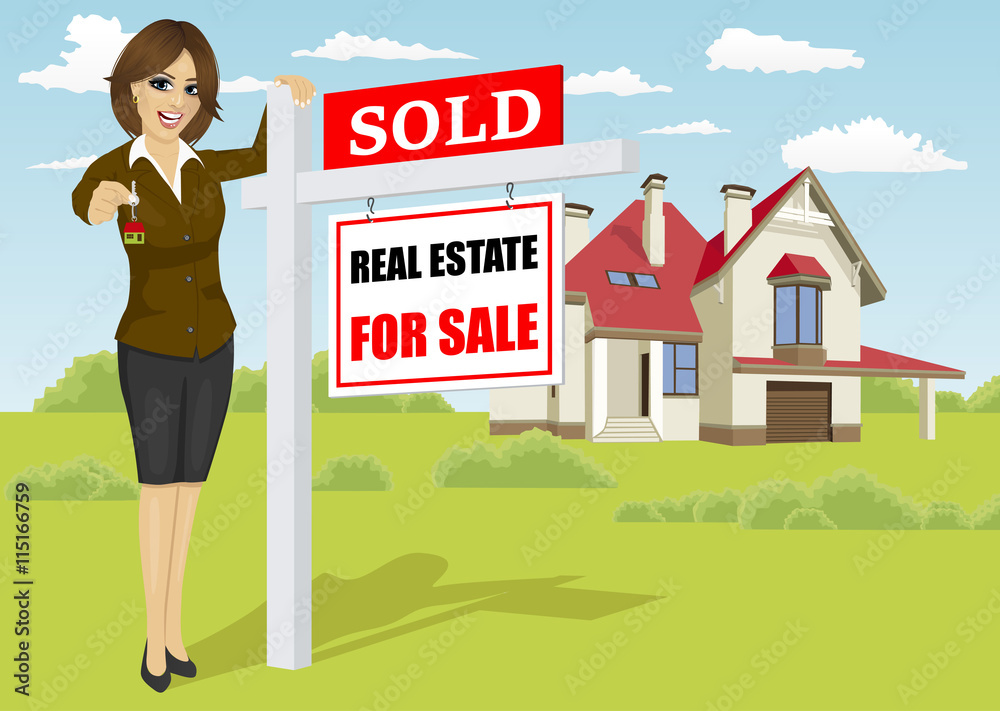 Female real estate agent standing next to sold for sale sign in front