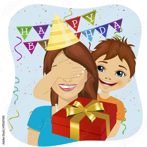 cute son covering her mother eyes giving surprise gift at birthday anniversary party