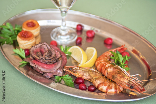 Grilled shrimps and beef meat