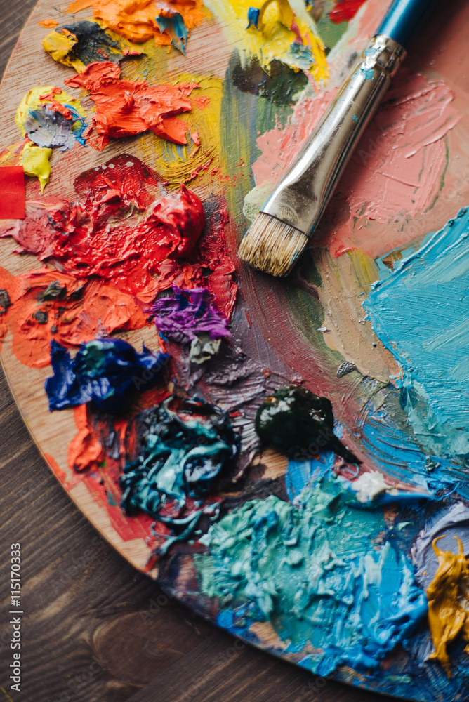 Obraz premium Closeup of paint mixing process in art workplace.