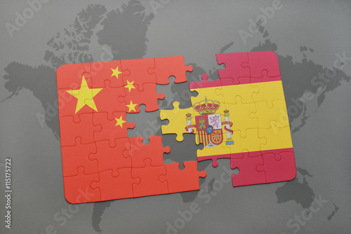 Canvas Print puzzle with the national flag of china and spain on a world map background