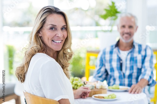 Happy woman with man in restaurant
