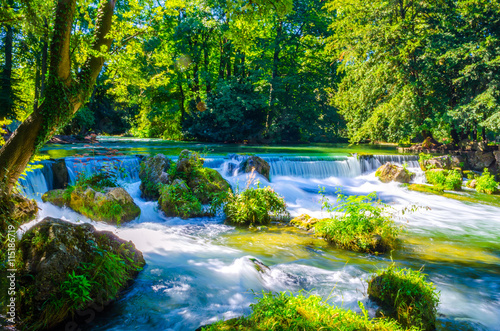 view of a creek in the English garden in Munich, Bayern, Germany photo