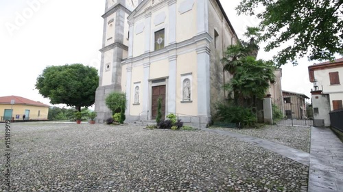 in italy castronno varese  ancient   religion  building    for catholic and clock tower. photo