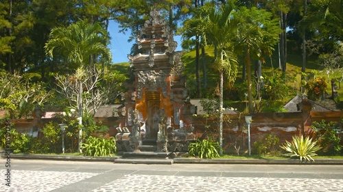 Beautiful and ornately carved main entrance gate to Tirata Empul, the historic Hindu Water Temple in Bali, Indonesia. Video 3840x2160 photo