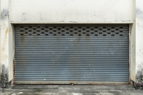 Old gray roller shutter door