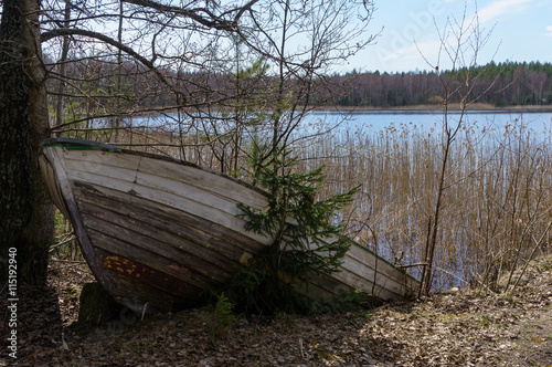 Abandoned boat on the lake