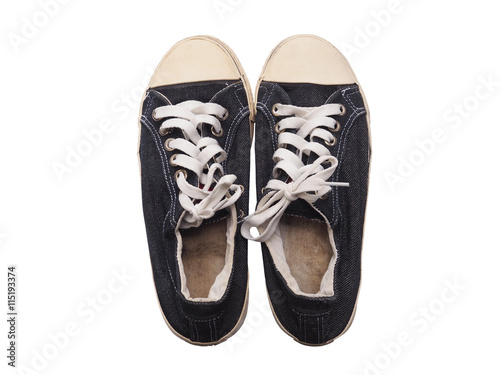 Old black sneakers shoe