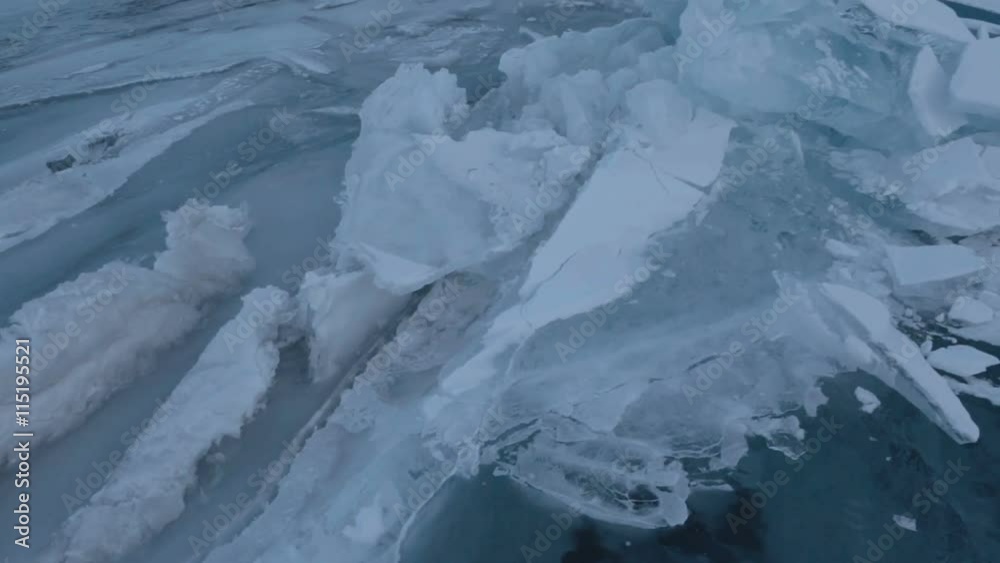 Large blocks of ice crack near Holy Nose Peninsula. Large blocks of ice crack near Holy Nose Peninsula.