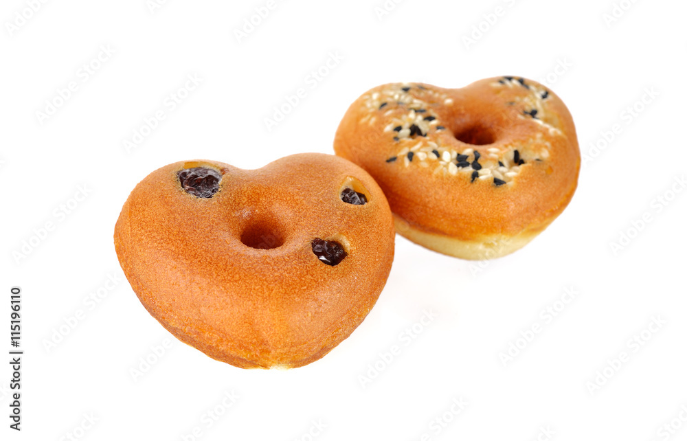 mini doughnut heart shape with sesame on white background mini doughnut heart shape with sesame on white background