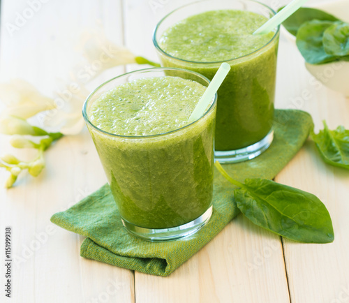 Green fresh healthy smoothies with fruits and vegetables