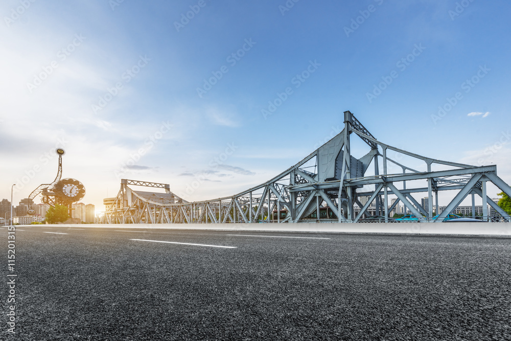 Fototapeta premium empty road front of modern buildings