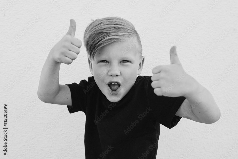 young emotional boy on bright background