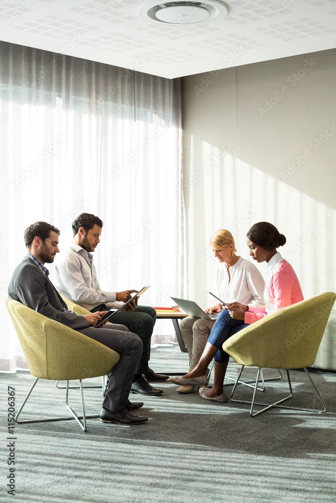 Business people using mobile phone, digital tablet and laptop Business people using mobile phone, digital tablet and laptop