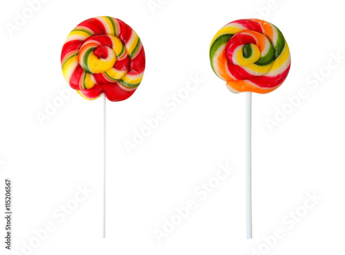 Swirling colorful lollipops on stick isolated on white background © Studio KIVI