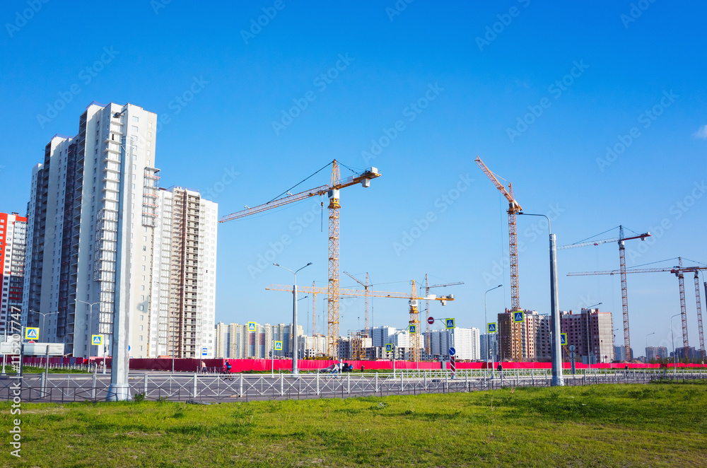 Block of flats under construction, working crane Block of flats under construction, working crane